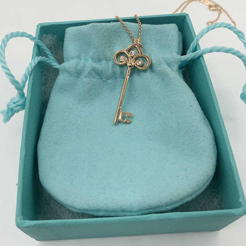 Pendant Necklaces S925 Silver Tiffanynet Crown Key Necklace Female Rose Gold Diamond Pendant Collar Chain Heart Shaped Sweater Chain Sunflower Iris