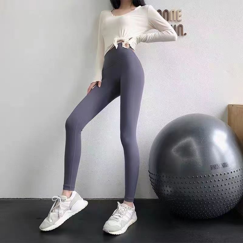 2024 new spring and autumn nude running pants women's high-waisted sports tights wear running peach quick dry yoga pants