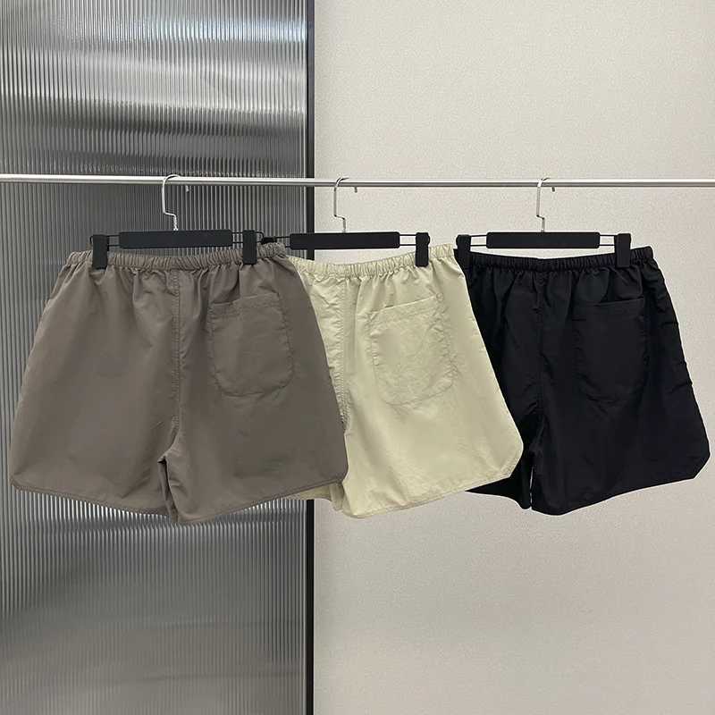 Mäns shorts shorts reflektion bokstäver utskrift avslappnad strand shorts för sommar hip hop streetwear kvinnor män snabb torr shortsl2402