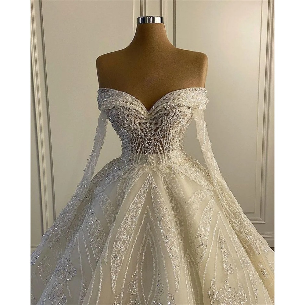 Superbe robe de mariée élégante à épaules dénudées et perles, manches longues, sur mesure, robes de mariée romantiques en dentelle, 2024