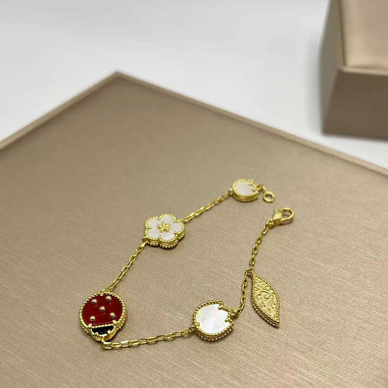 Designer smycken lyxarmband länkkedja Vanca Fyra bladklöver fem blomma armband för kvinnors avancerade känsla titanstål pläterat 18k rosguld nyckelpiga armband