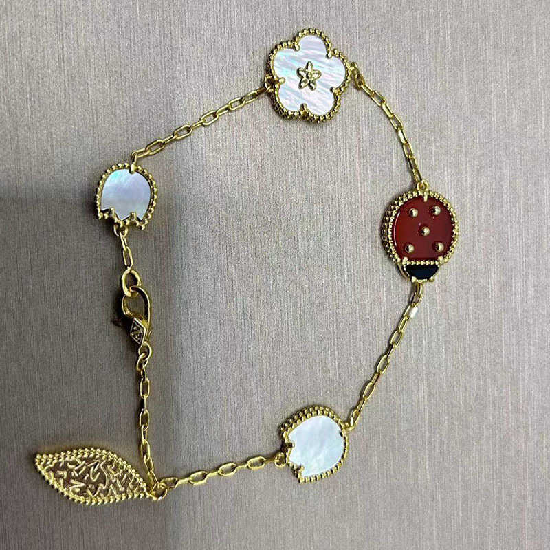 Designer smycken lyxarmband länkkedja Vanca Fyra bladklöver fem blomma armband för kvinnors avancerade känsla titanstål pläterat 18k rosguld nyckelpiga armband