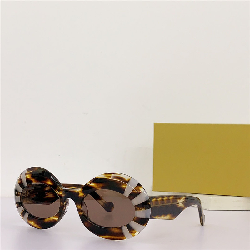 새로운 패션 디자인 타원형 선글라스 40091 아세테이트 프레임 메탈 고전 아나 그램 사원 팔 팔을 단순하고 인기있는 스타일 야외 UV400 보호 안경