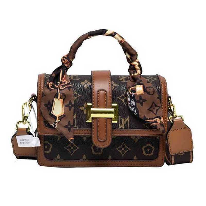 2024 New Designer Womens Crossbody ombro Pequeno cinto largo da primavera Bolsa mensageira portátil portátil