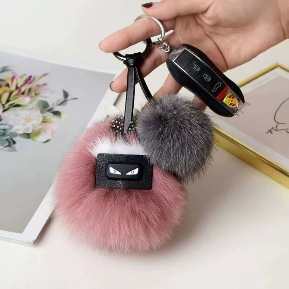 luxury logo Fluffy Karl Genuine Raccoon Fur Pompom Monster Bag Bugs Charm Keychain Plush Key Ring Leather Tassel Pompom 7777