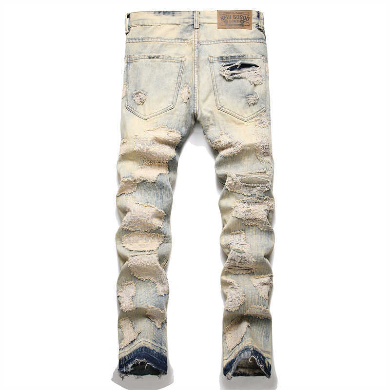 Xintang Nytt kryddig bläck perforerade jeans för mäns koreanska version Trend Stretch Slim Fit Casual Small Foot Long Pants for Men
