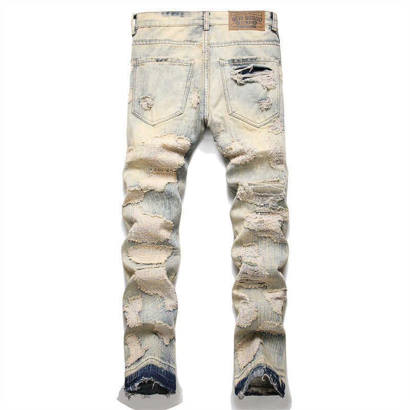 Xintang nouveau jean perforé à l'encre épicée pour hommes Version coréenne tendance Stretch coupe ajustée décontracté petit pied pantalons longs pour hommes