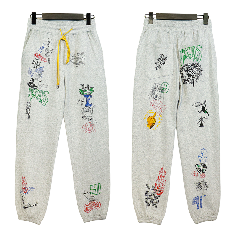 Designer High Street Cartoon Graffiti Rétro main lâche pantalons décontractés pour hommes et femmes pantalons de survêtement de style automne avec sweat à capuche chemises d'automne et d'hiverS-XL