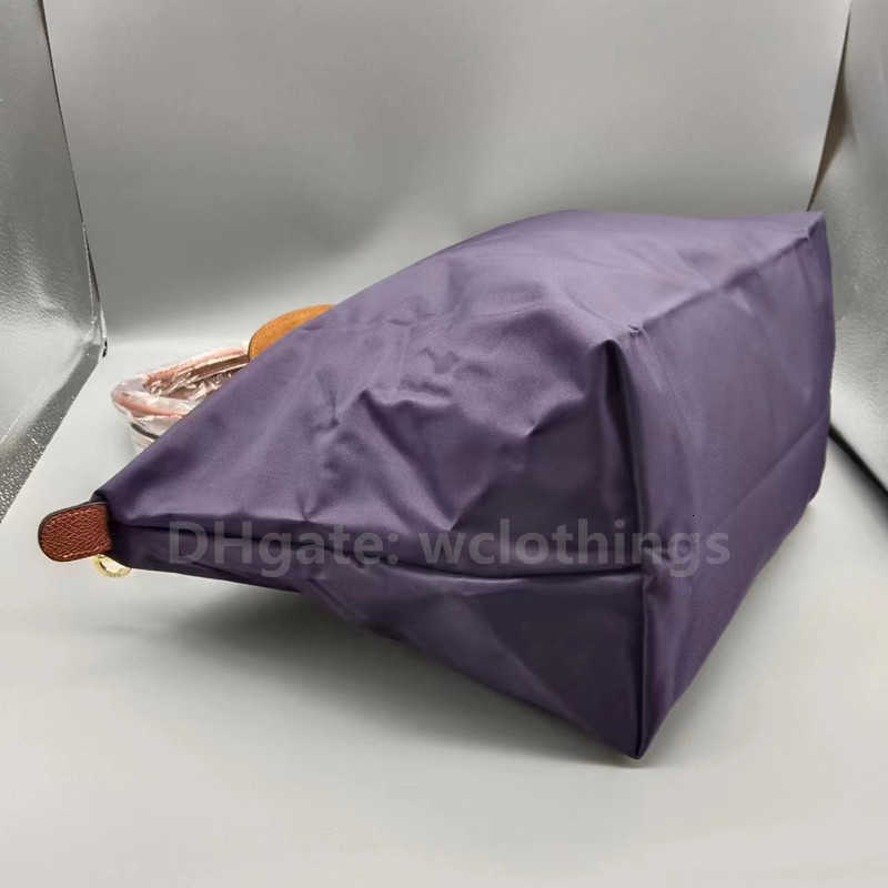 Bolsas Classic Brand Handbag Women Women Genuine Leather Nylon Nylon Gran Almacenamiento Caballo de almacenamiento 70 aniversario Sling Bag304p