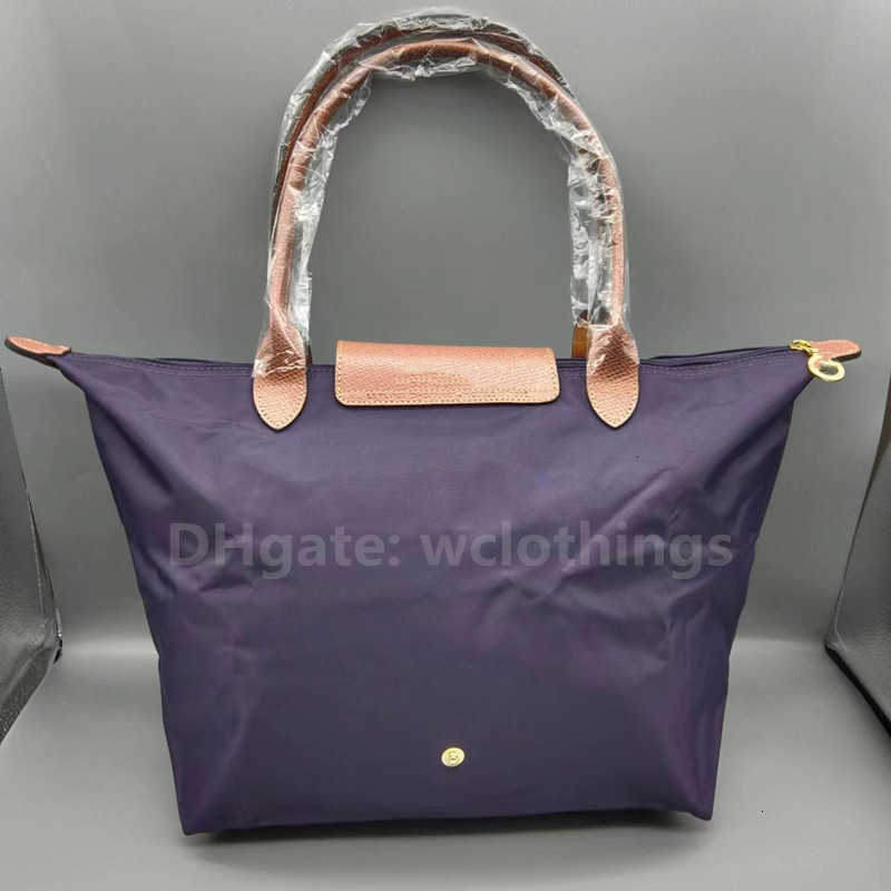 Bolsas Classic Brand Handbag Women Women Genuine Leather Nylon Nylon Gran Almacenamiento Caballo de almacenamiento 70 aniversario Sling Bag304p