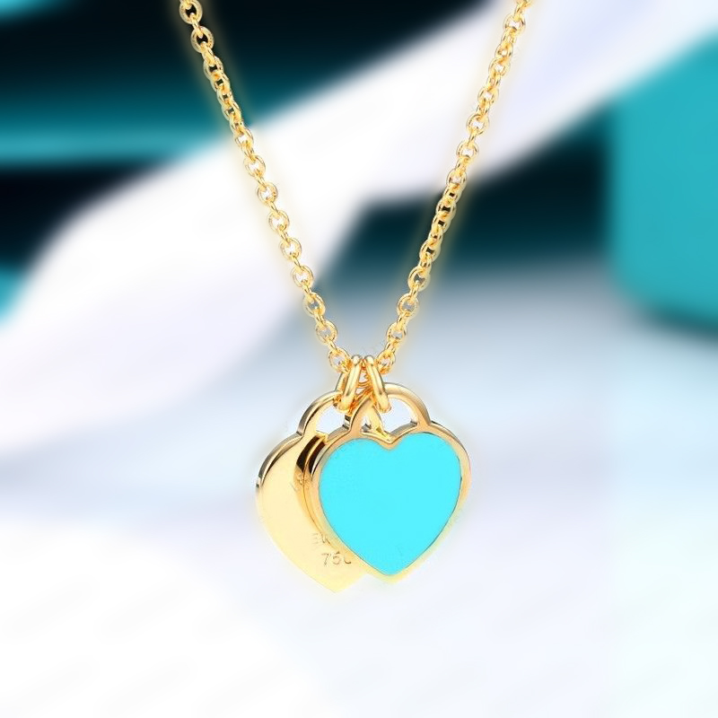Coeurs avec des clés roses accessoires de créateurs en gros en forme de coeur en acier inoxydable double coeur bijoux de Noël dames de luxe femmes pendentif boîte de diamant esprit