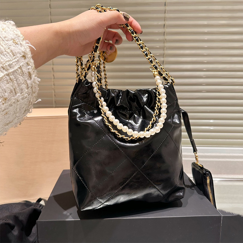 Klasyczna designerska torba crossbody 2023 NOWOŚĆ PARES Fashion Womens oryginalna skórzana marka mini śmieciowa torba wysokiej jakości metalowej torby na ramię