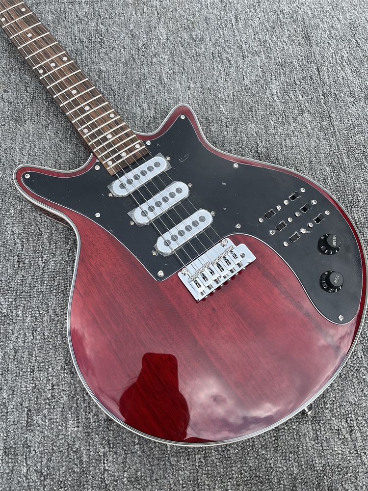 Disponible dans le commerce, signé par Brian May, guitare électrique vintage spéciale à 6 cordes rouge cerise, camionnette et interrupteur noir