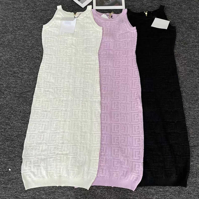 Le créateur de Urban Sexy Dresses Balman a tricoté une lettre évidée avec une robe gilet sans manches à bretelles avec un style élégant et luxueux, nouveau pour l'été 2023 1GIB