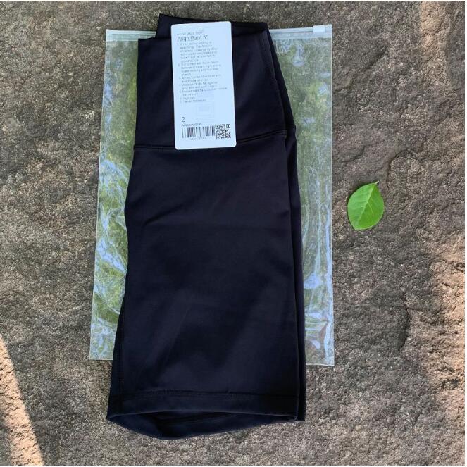 LL Abiti da yoga Suit Align Pantaloncini da yoga a vita alta lo sport da donna Pantaloni a 4 punti Pantaloni da corsa Fitness Intimo da palestra Leggings da allenamento lu