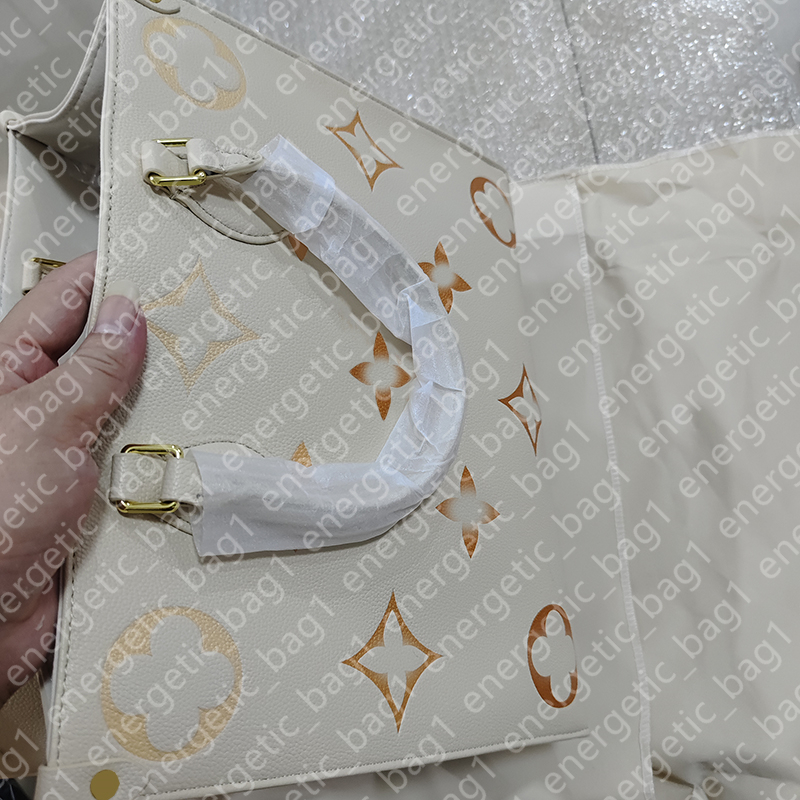 Lüks kadın çantalar moda alışveriş çantaları baskılı çanta tasarımcısı yüksek kaliteli tote çanta çiçek kabartmalı pembe kılıf çanta klasik omuz çantaları debriyaj çantası bayan #v
