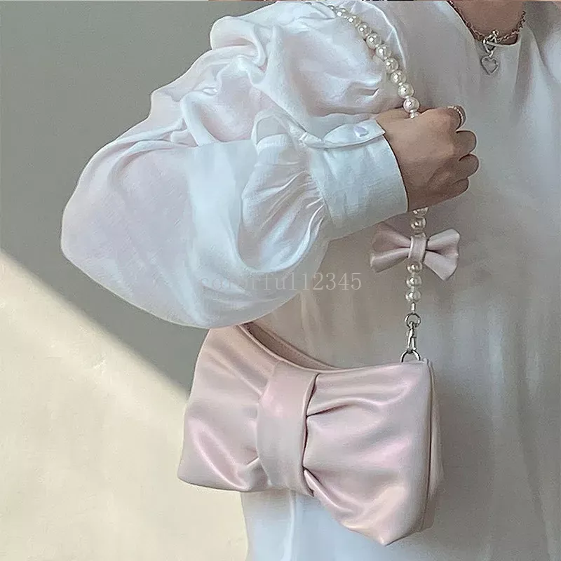 2023 pérola bowknot axilas saco para mulheres rosa branco perolado bolsa de ombro ins designer suave bolsa crossbody sacos de armazenamento