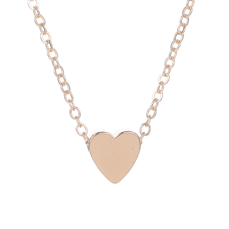 Collier simple en or 18 carats avec pendentif en forme de cœur en forme de clavicule