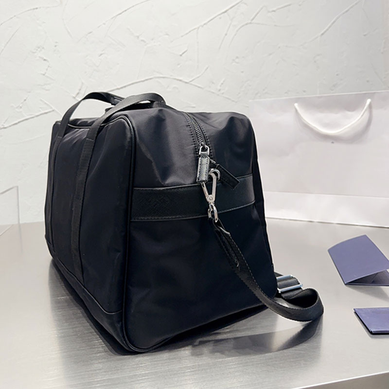 Bolsa de Nylon Duffel à prova d'água de 43cm de grande capacidade para bolsas de ombro de letra de moda Triângulo Bolsas de bagagem de bagagem homens esportes femininos trave207z