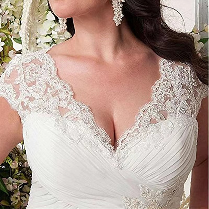 New wedding dress European and American new ivory deep V-neck lace tail Sen series main AB080101