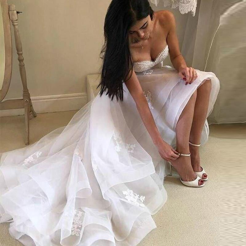 2023 A Line Wedding Dresses Sweetheart Sleeveless Lace Appliques High Low Tiered Country Beach Wedding Dress Bridal Gown Robe Mariage Vestido de Novia