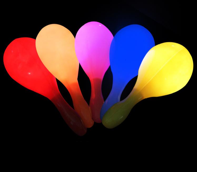 Decorazione del partito LED lampeggiante Maracas illumina Neon Beach Hula Party Maracas Bar adulti KTV Cheer Props Glow Party Supplies SN5082