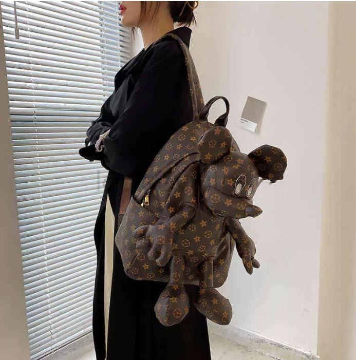 Bolso de diseñador Mochila de cuero Europa y América Hombre Mujer Marca de moda Flor vieja Nueva mochila para estudiantes de gran capacidad