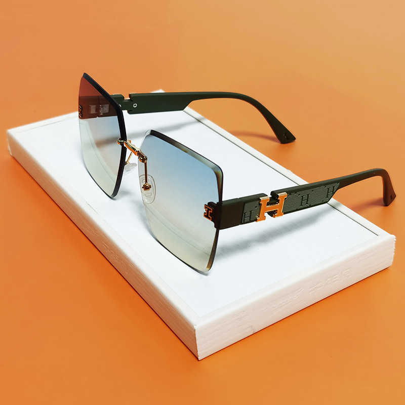 2023 lunettes de soleil de designer de luxe 23 Nouvelles lunettes de soleil sans cadre avec dégradé de couleurs avancé Conduite féminine Tendance de la mode Tiktok Net Lunettes de soleil rouges