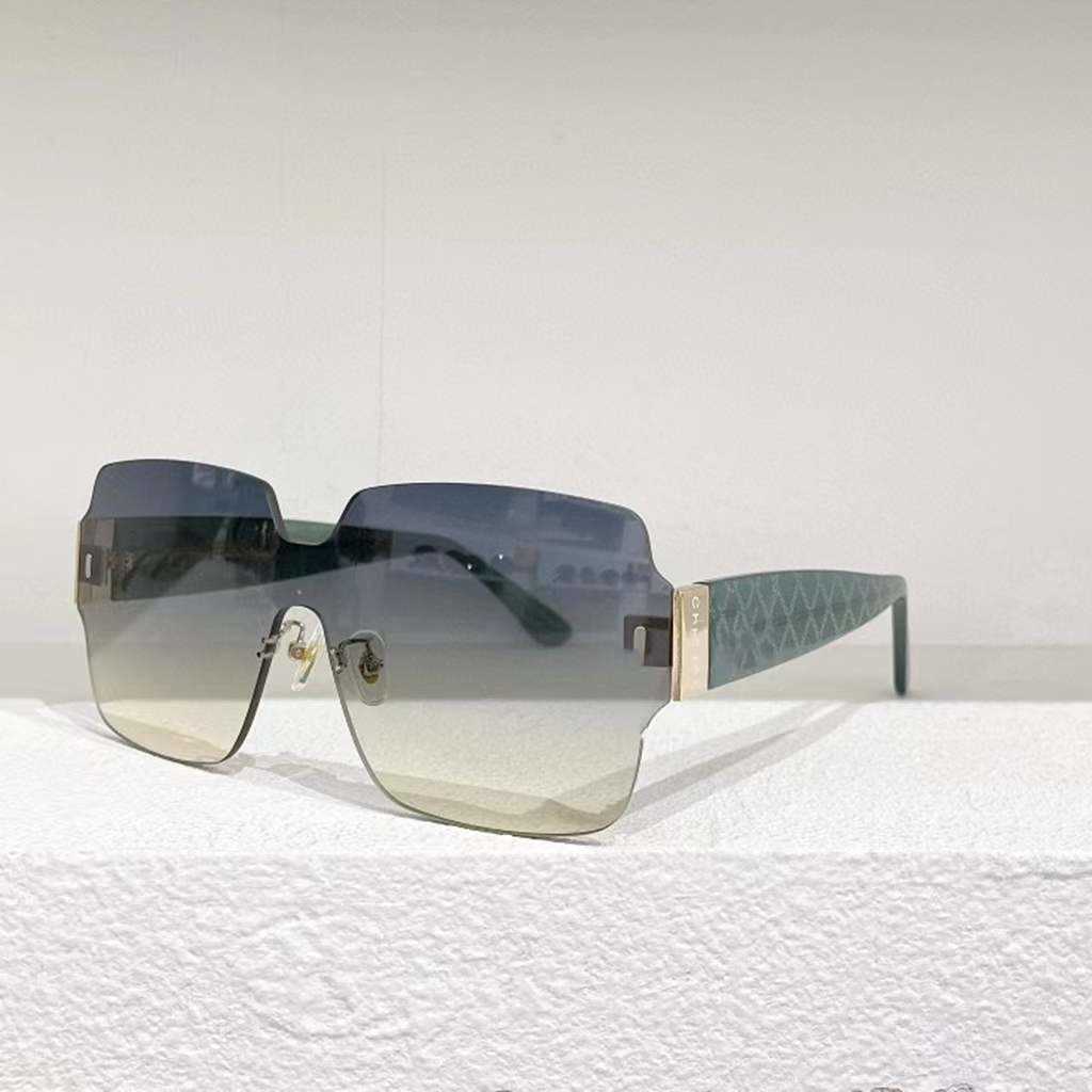 2023 Ny lyxdesigner Nytt nätrött Samma typ av ramlös platta godisfärgade solglasögon Kvinnors mångsidiga solglasögon 8162