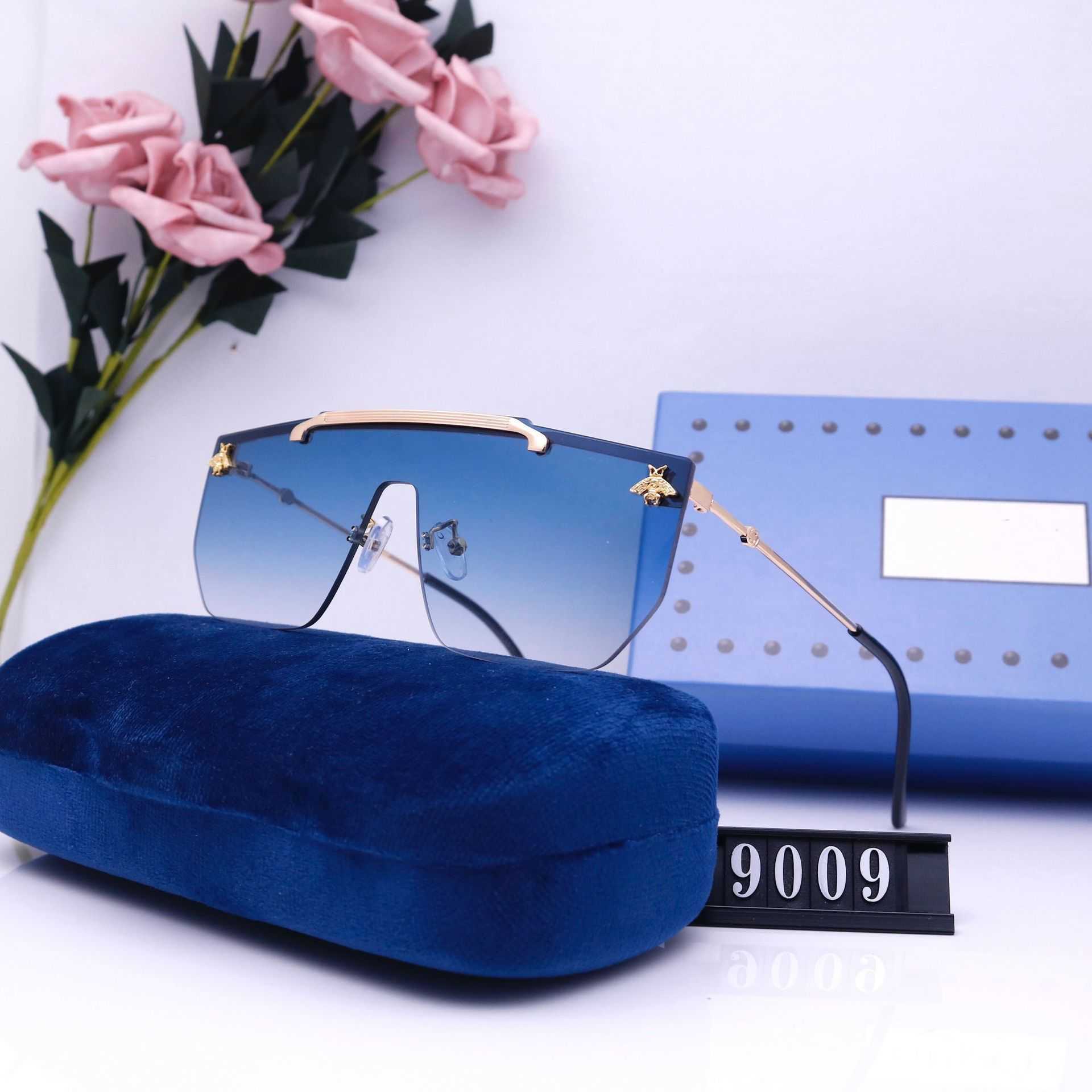 2023 nouveau designer de luxe à l'étranger nouveaux hommes et femmes externes lunettes de soleil photo de rue tourisme lunettes de mode 9009