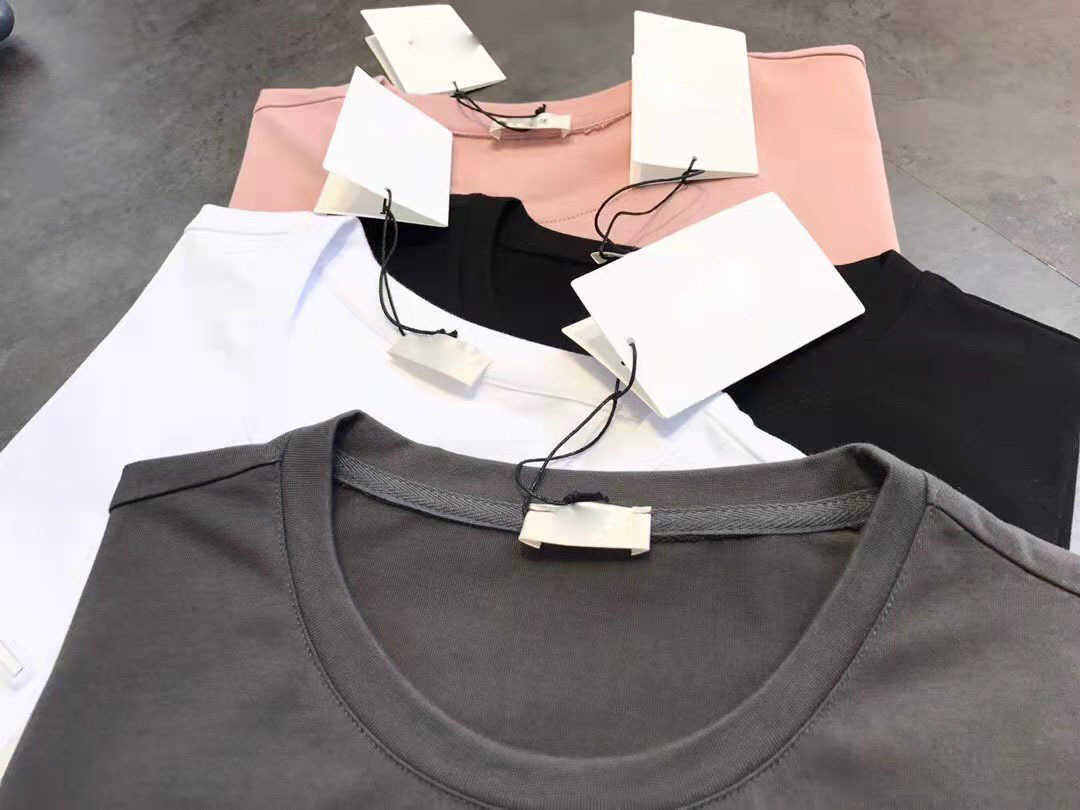 Våren/sommaren ny 3D konkavt stålutskriftsbrev T-shirt för män och kvinnor förlorar kort bläck
