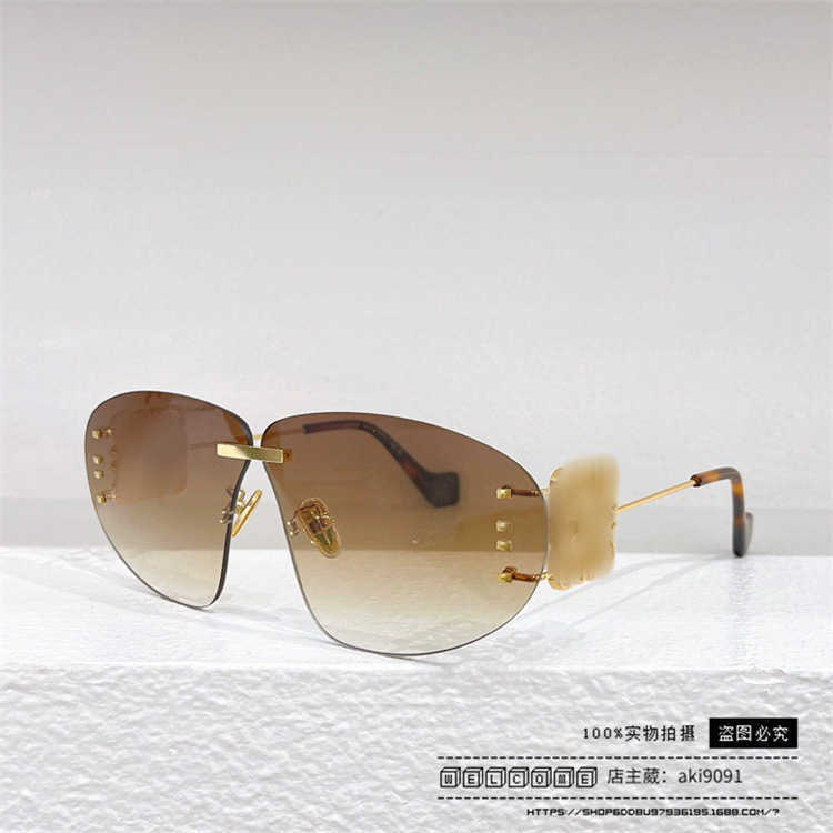 2023 Lyxdesigner solglasögon 23 Nya Luo Yijia med ramlösa metallkantsinsatser och personliga LW40048U -solglasögon