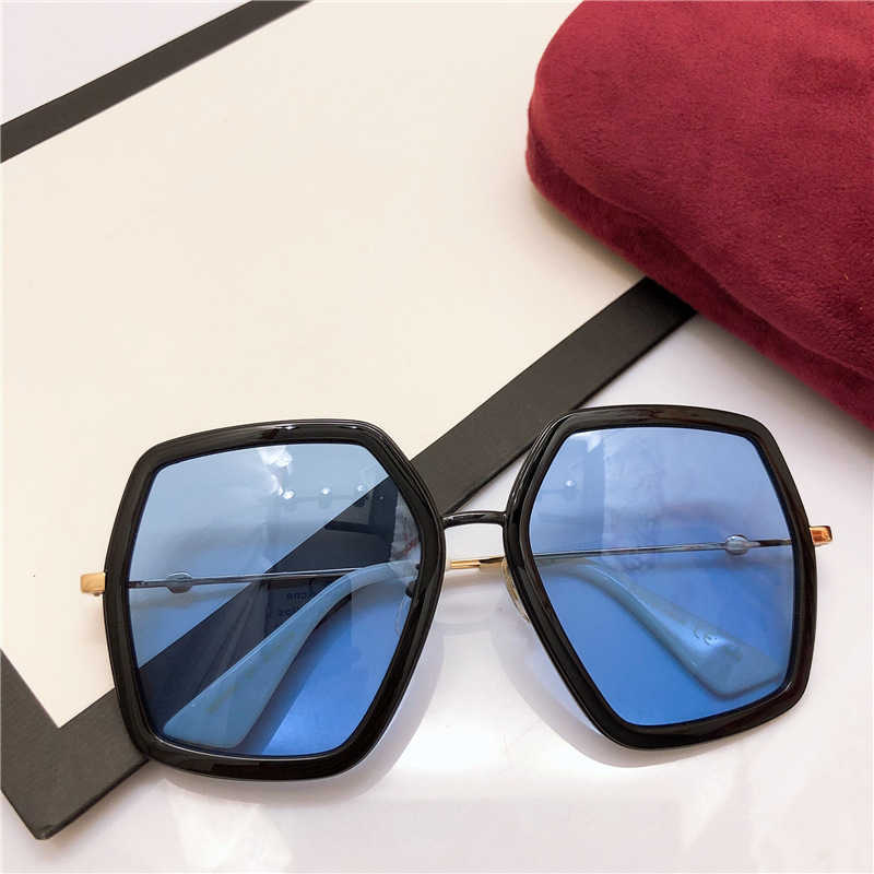 2023 Nuevas gafas de sol de diseñador de lujo Gafas de sol poligonales de moda para mujer de la familia G Ni INS Online Red Same Year of the Pig Edición limitada GG0106s