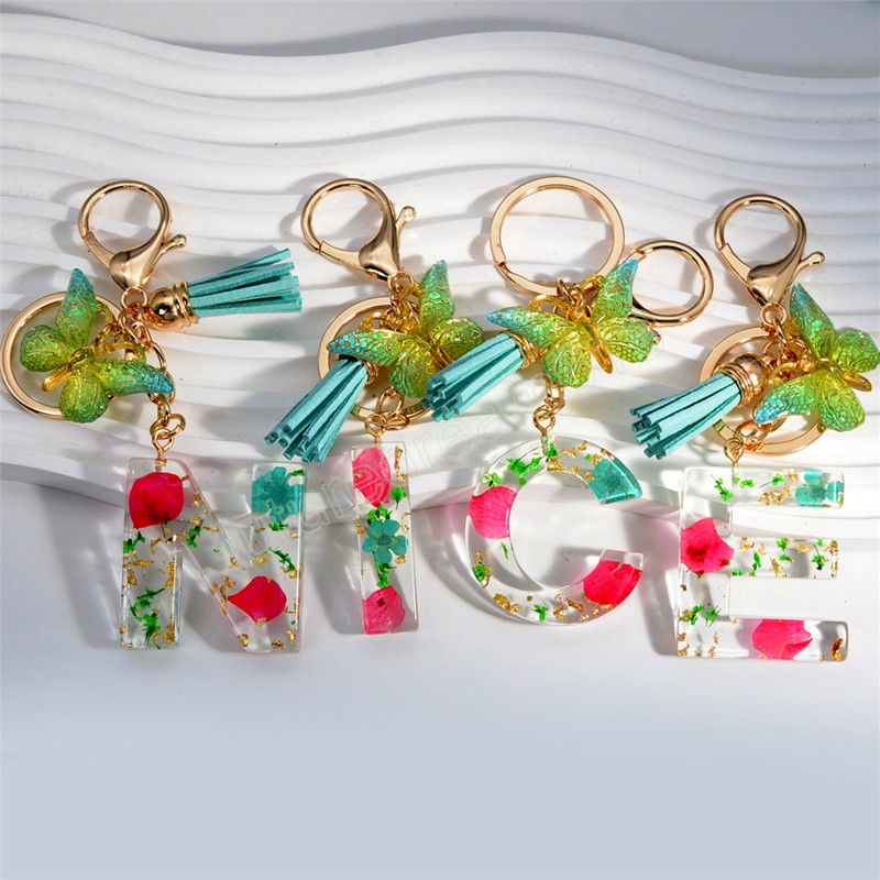 Fashion Letters A to Z Dry Flower Keychain Butterfly Tassel Pendant Keyring for Women Car Key Holder Handbag Accessories Gift
