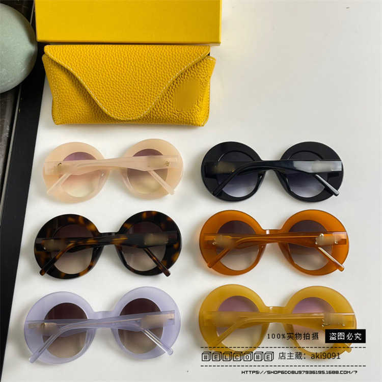 2024 New High Quality luxury designer New Luo Yijia sunglasses round frame mesh red INS the same style personalized and fashionable Sunglasses LW40089