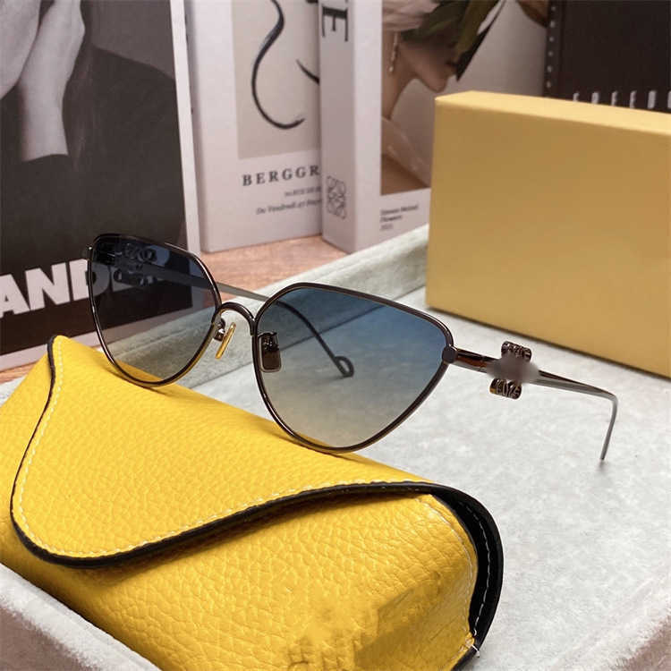 High quality fashionable luxury designer sunglasses New Luo Yijia Metal Cat's Eye Red INS Same Personalized LW Sunglasses Fashion Style 1