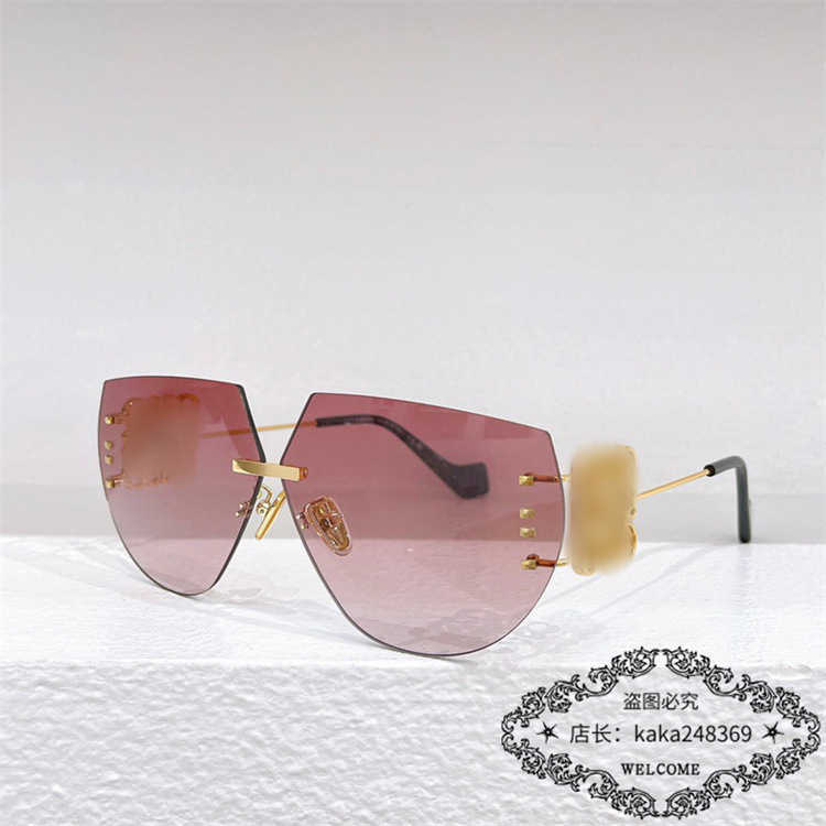 2023 Ny lyxdesigner Luo Yijia Style Solglasögon Female Star Frameless Metal Solglasögon Male Fashion LW40049