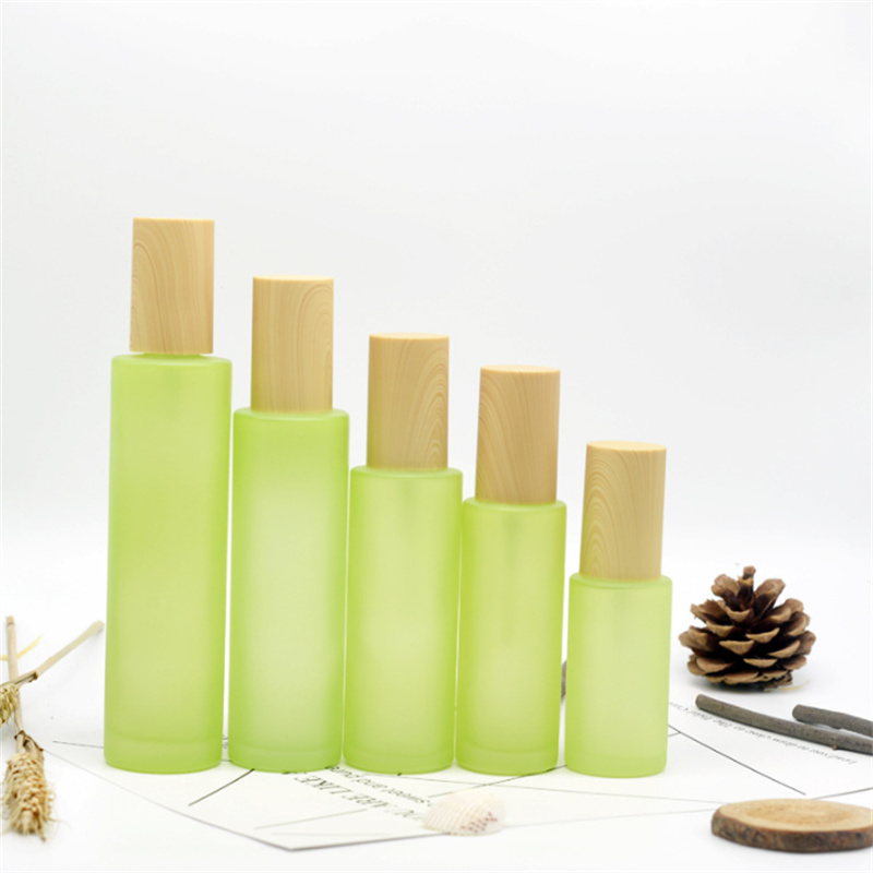 20ml 30ml 40ml 60ml 80ml 100ml 120ml Green Green Glass Cream Jar Mist Pray Pump Bottle مع أغطية خشبية أغطية تجميلية JL1795