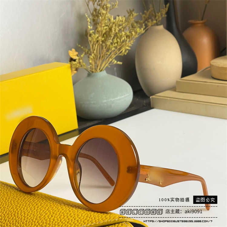 2024 New High Quality luxury designer New Luo Yijia sunglasses round frame mesh red INS the same style personalized and fashionable Sunglasses LW40089