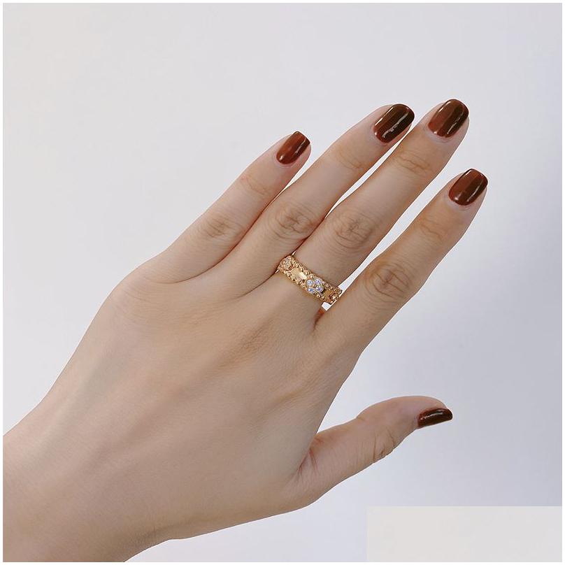 Band Rings Kaleidoscope Ring Female Minority Design Sense Of Fashion Simple Clover Jewelry Plated Rose Gold Drop Delivery Dhw1B