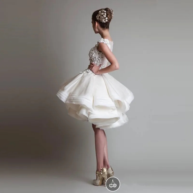 Krikor Jabotian Korte Kanten Trouwjurken 2023 Bateau Kapmouwtjes Ruglooze Knielengte A lijn Organza Strand Bruids Bowns