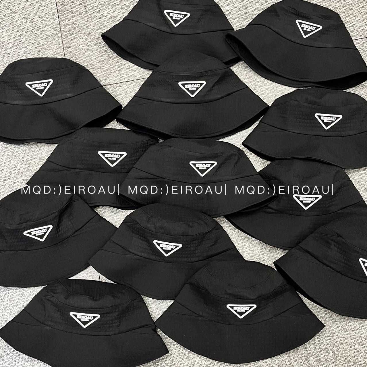 Sombrero de lujo de diseñador superior Nuevo sombrero de cubo Corea del Sur Versátil Letras simples Estilo occidental para hombres y mujeres universal