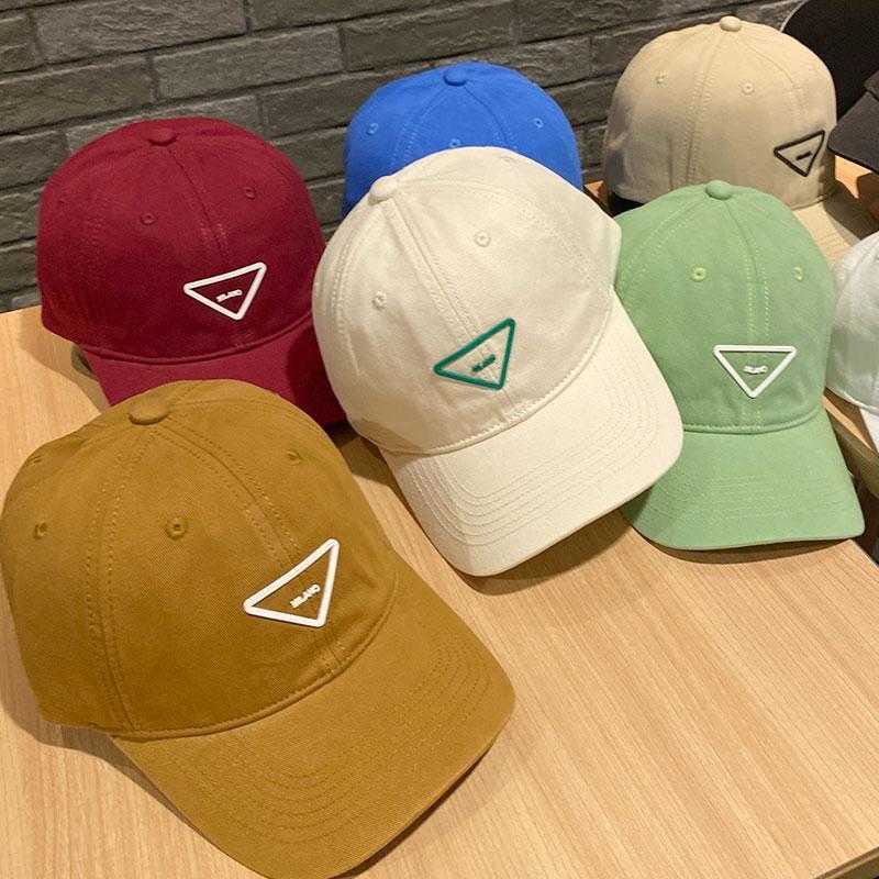 Toppdesigner lyxiga hatt koreanska hattar Ny baseballmössa för män och kvinnor på vårens sommarmode triangel kupol liten ansikte solskyddsmedel