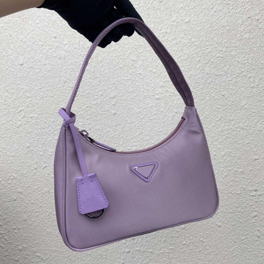 2023 Fabrik Direktförsäljning Högkvalitativ klassisk mode mångsidig hobo triangel Nylon tyg Half Moon Medieval Club Single Shoulder Underarm Handheld Women's Bag