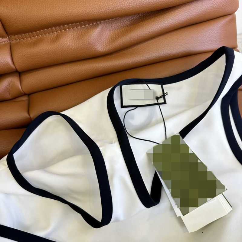 Robes décontractées basiques Robe sans manches blanche brodée de lettre de créateur, élégante et élégante, ceinture enveloppée à la taille longue robe débardeur suspendue UBK6