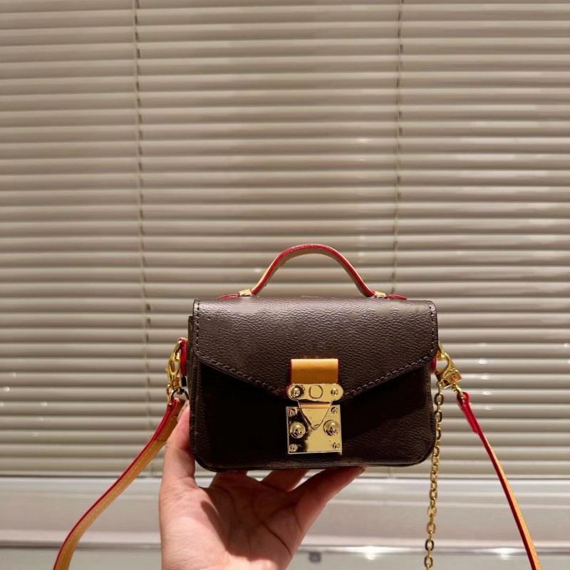 Modieuze klassieke mini -handtas 2023 Nieuwe topklasse oude bloemen lederen retro flap buckle dames handheld een schouder crossbody tas dagelijks gratis verzendpakket