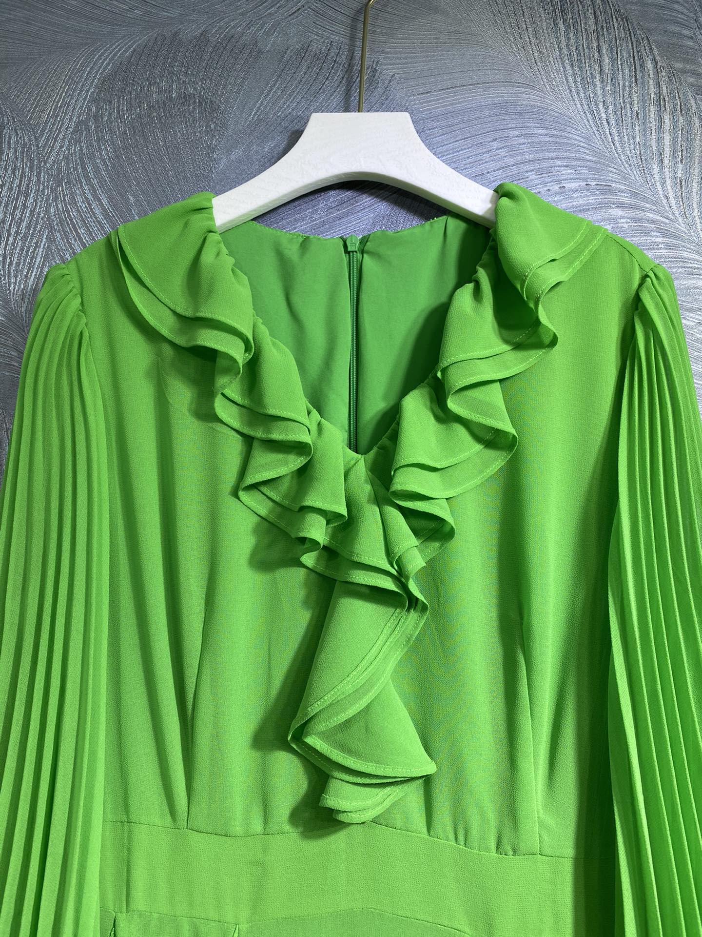 Designer dress for seaside vacation, ruffled green dress, elegant and elegant with a long swing