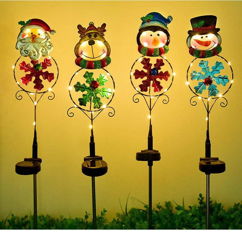 クリスマスソーラーローンライトアイアンワークリードスノーマンエルクペンギンアウトドアライトガーデンスティック芝生の装飾照明温かい家の装飾