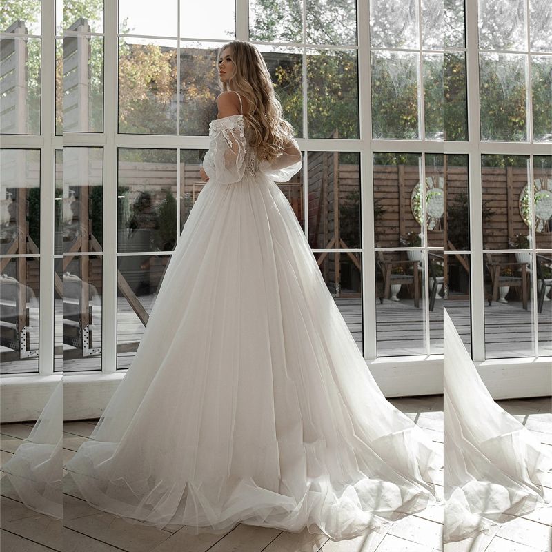 2023 Vintage Bobemian A Line Wedding Dresses Off Shoulder Applicies spetsblommor Tulle långa ärmar Sexig ren topp brudklänningar korsett tillbaka