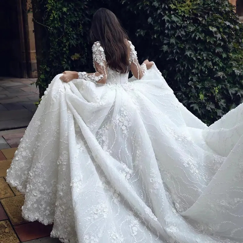 Abito da sposa elegante 2024 Collo trasparente Fiori 3D Applicazioni di pizzo Maniche lunghe Abiti da sposa Abiti africani da Noiva